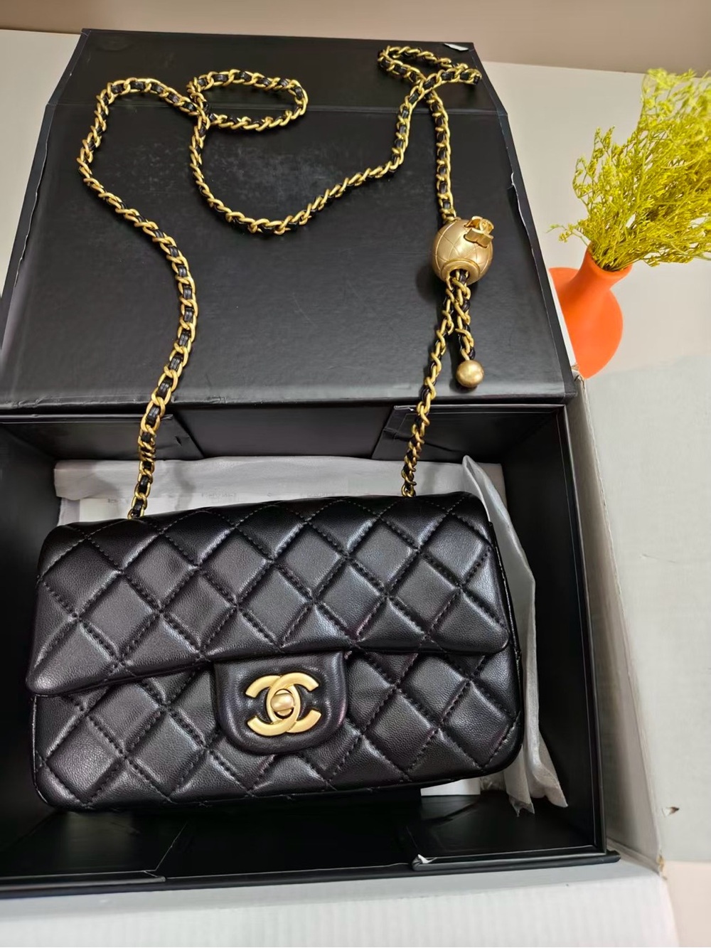 Chanel Quilted Leather Mini Flap Bag in Black with Gold Hardware